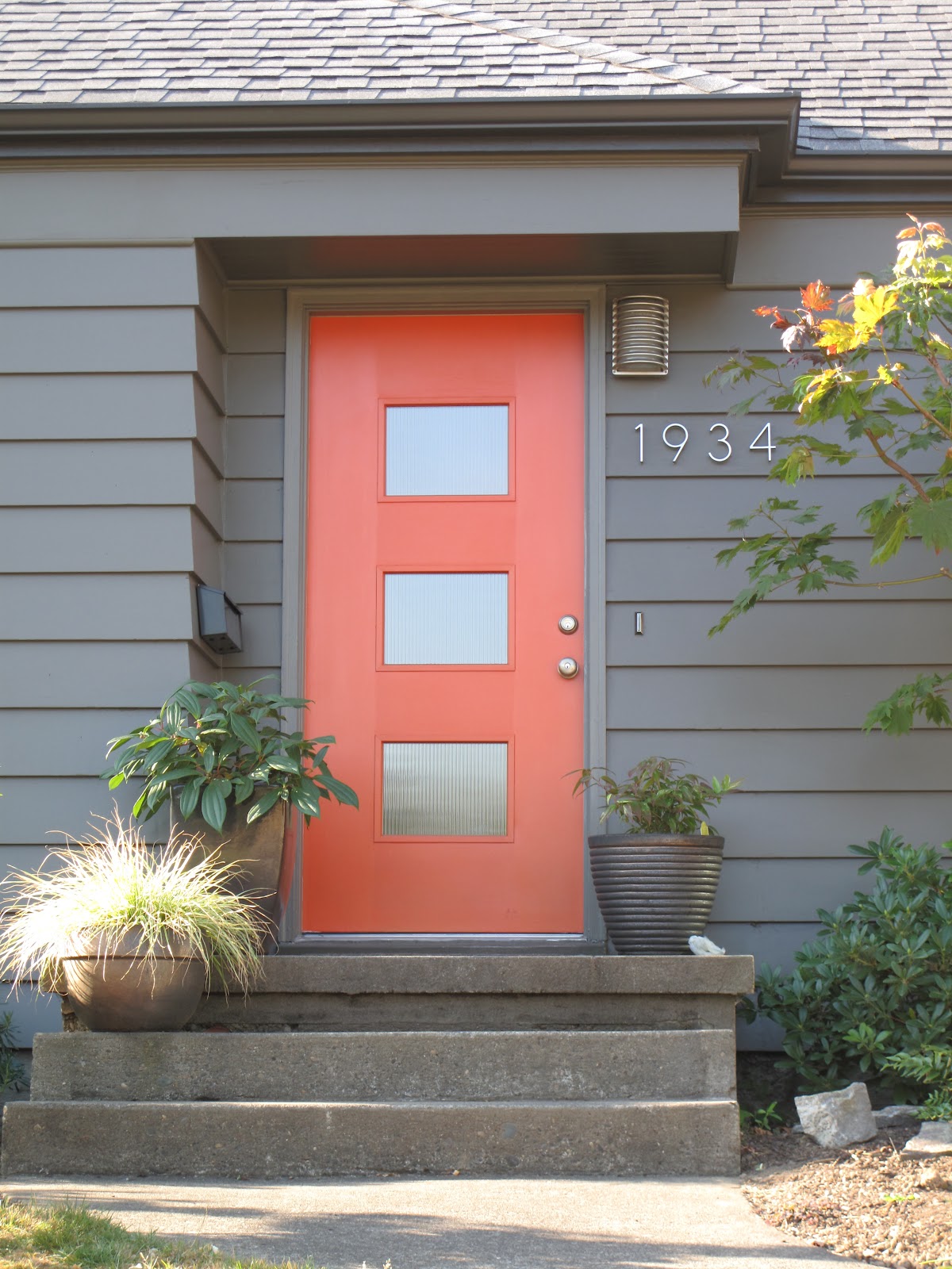 Grey and redorange front door Exterior door designs, Exterior paint