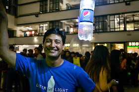 Illac Diaz, Founder of Liter of Light poses by the solar bottle light at The Pepsi x Liter Of Light "Ignite The Light" Tour at PMQ, Central on March 15, 2015 in Hong Kong