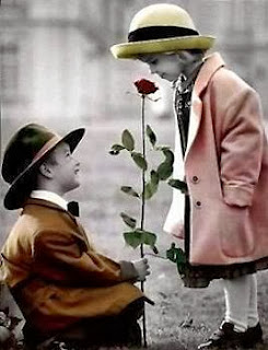 Boy giving rose to girl in lone lovely Picture