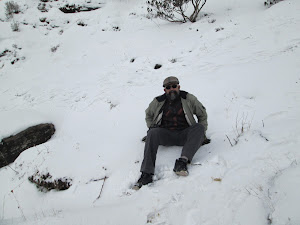 Resting on the snow at Tsomgo lake.
