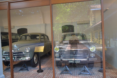ho chi minhs collection of used cars , stilt house, hanoi