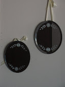 Mirrors by our Mercantile door, for Proprietress and Head Clerk