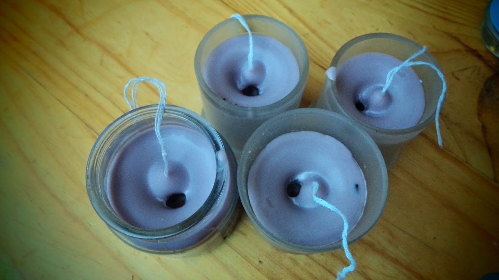 Refilling old candle holders with new home made candles!