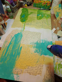 book pages,green,tan,blue, turquoises,