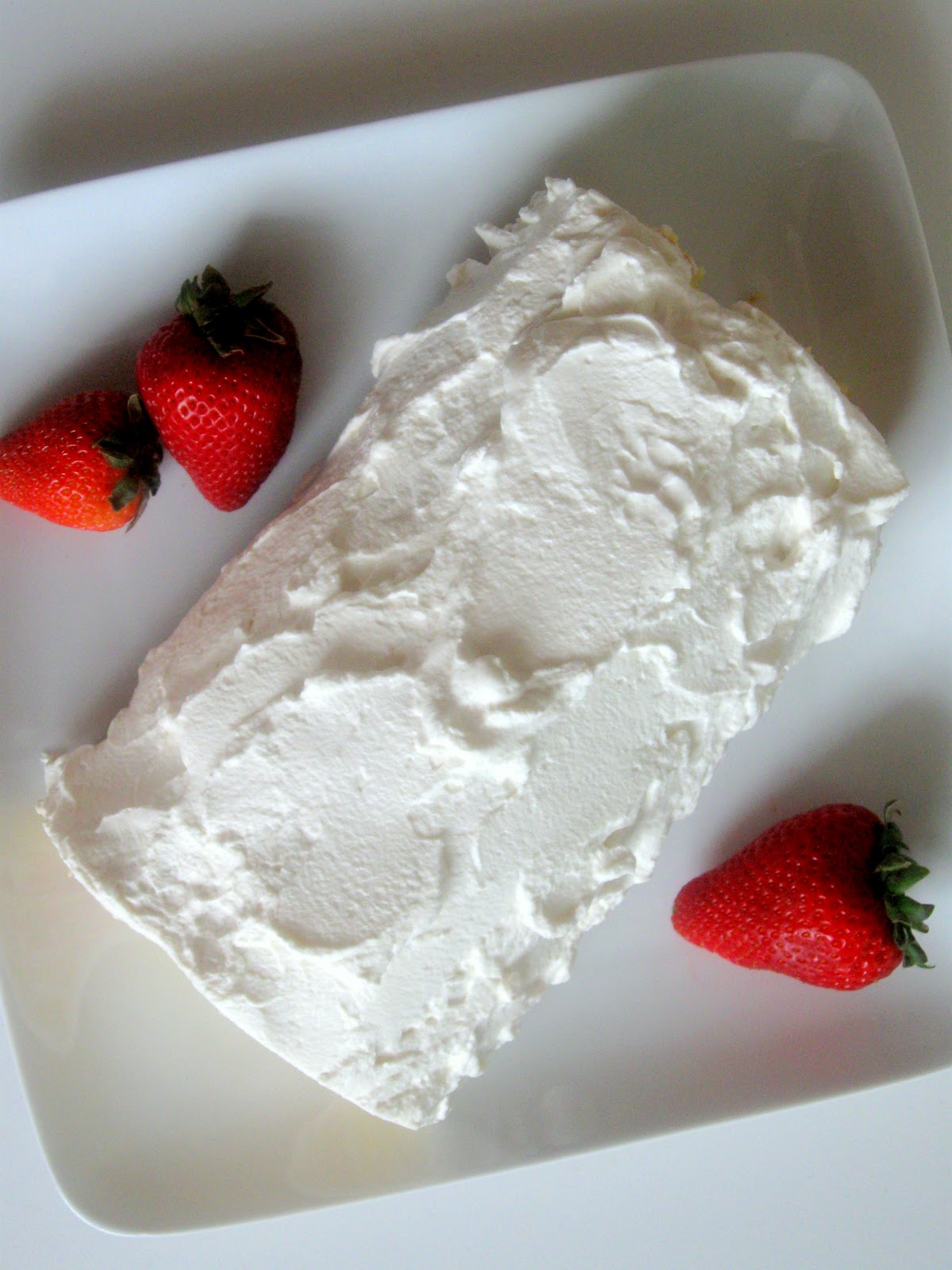 Strawberry Roulade Cake with Whipped Cream Frosting