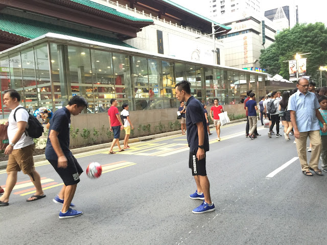 Pedestrian Night on Orchard Road - Playing Soccer 2