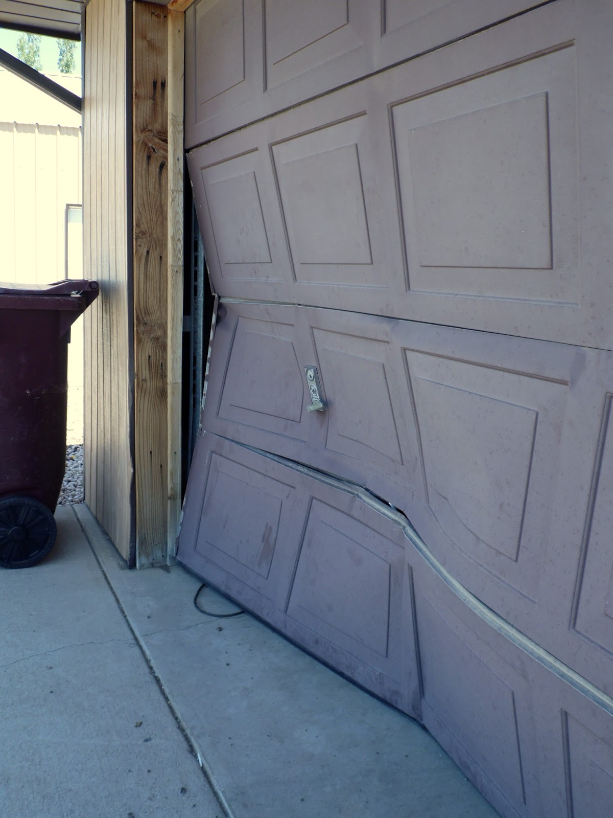 Brandon and Jennifer A Broken Garage Door