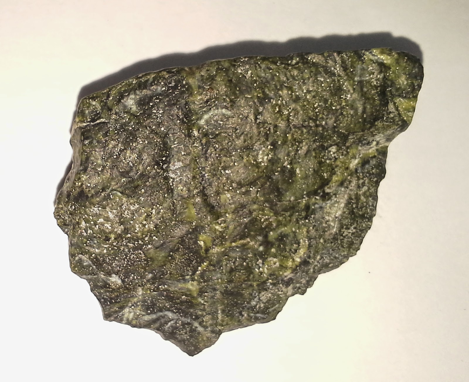 stone attracted to a "Dark green" What kind of stone Rock