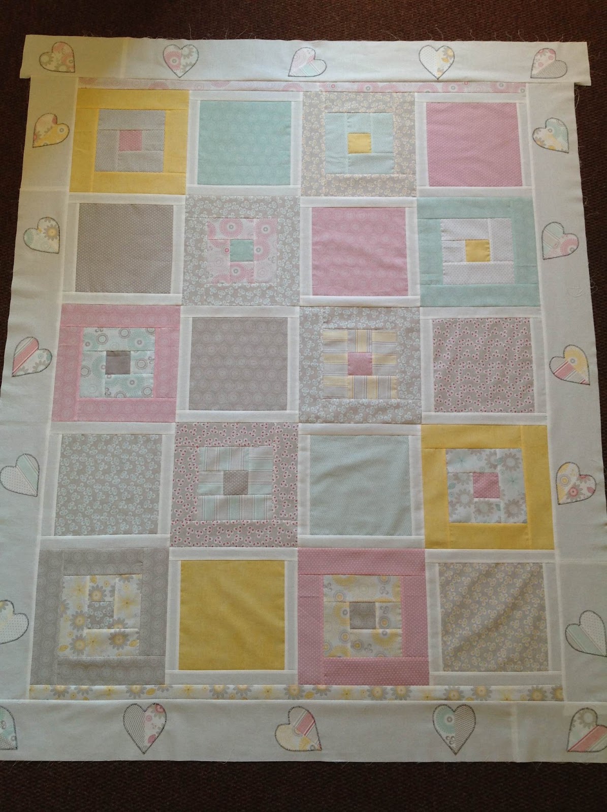 Stitch by Stitch Finished baby quilt top..