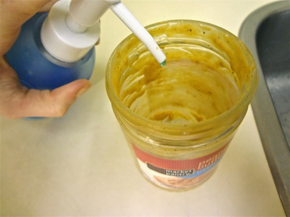 Add a squirt of dish soap to your dirty peanut butter jar.