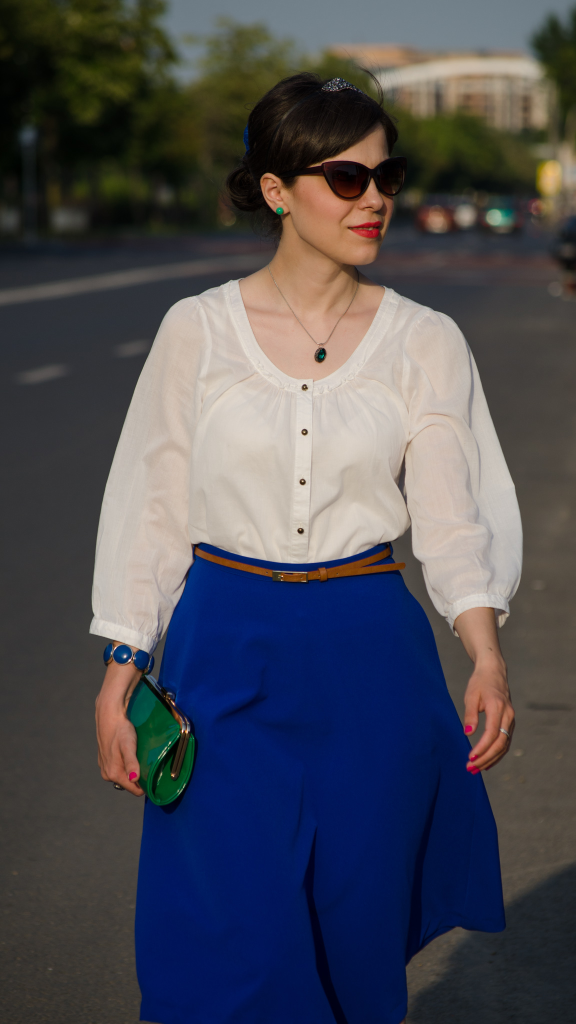 cobalt skirt white shirt emerald green heels emerald green clutch