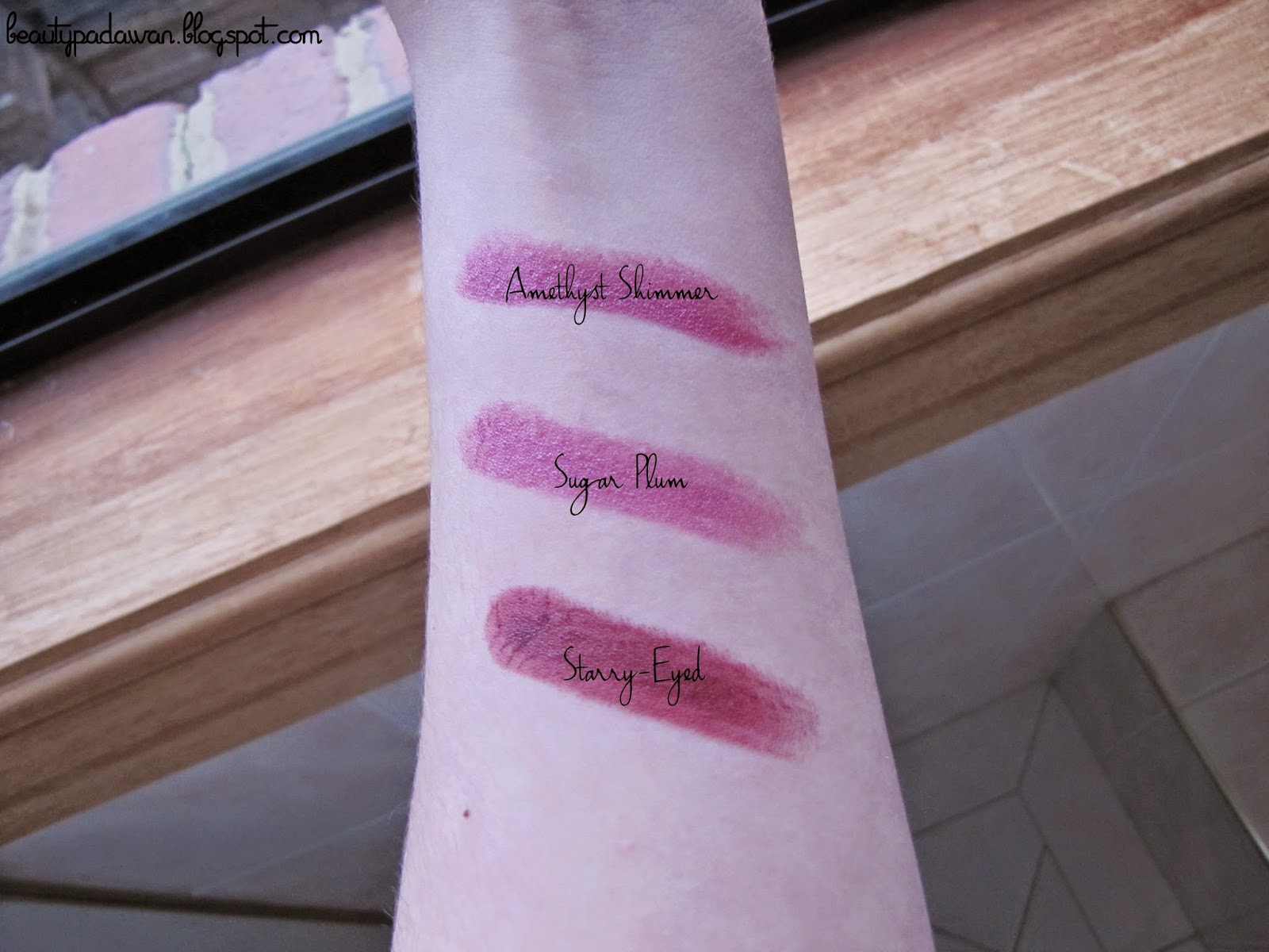 Swatches of Rimmel Lasting Finish Lipstick in Amethyst Shimmer, Sugar Plum and Starry-Eyed.