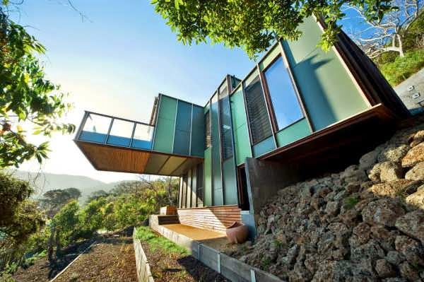 Small Wooden House Design On A Steep