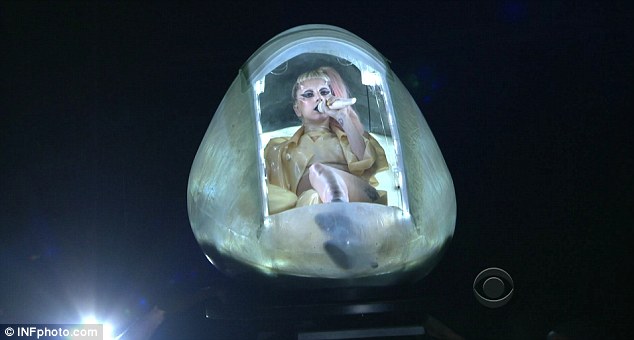 lady gaga egg costume grammys 2011. Egg-xellent: At one point Gaga