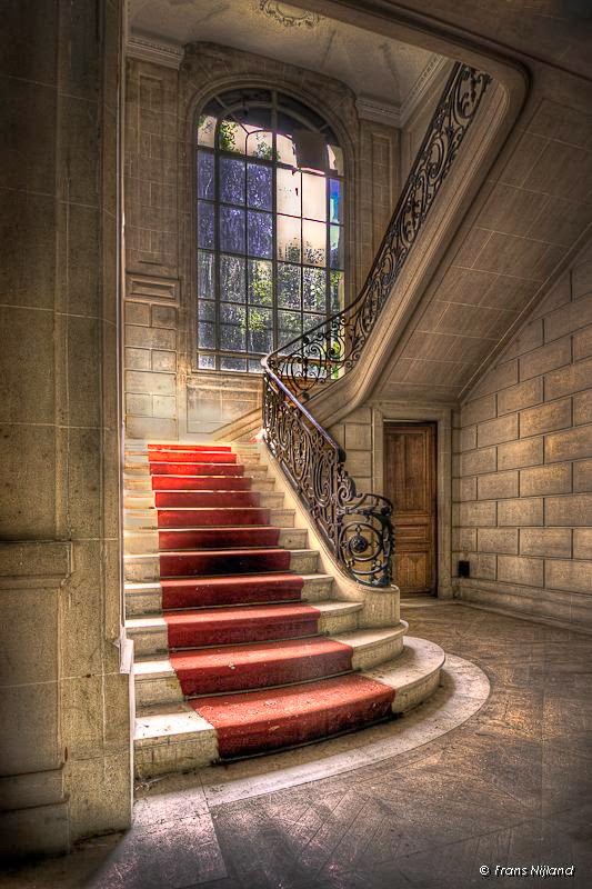 staircase in an abandoned French castle stairs in an abandoned French castle