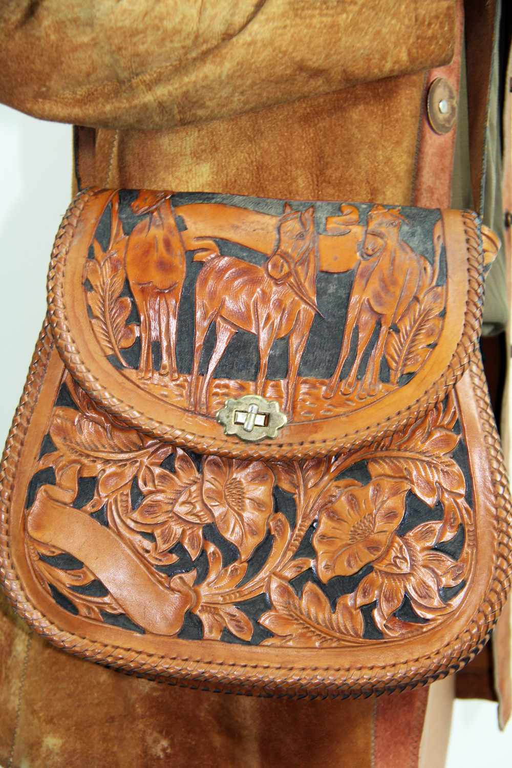 https://www.etsy.com/listing/115158598/mexican-tooled-horse-leather-purse?ref=listing-shop-header-3