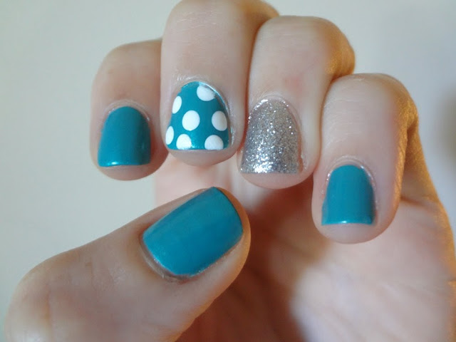 Turquoise nail polish, silver glitter, polka dots, accent nails