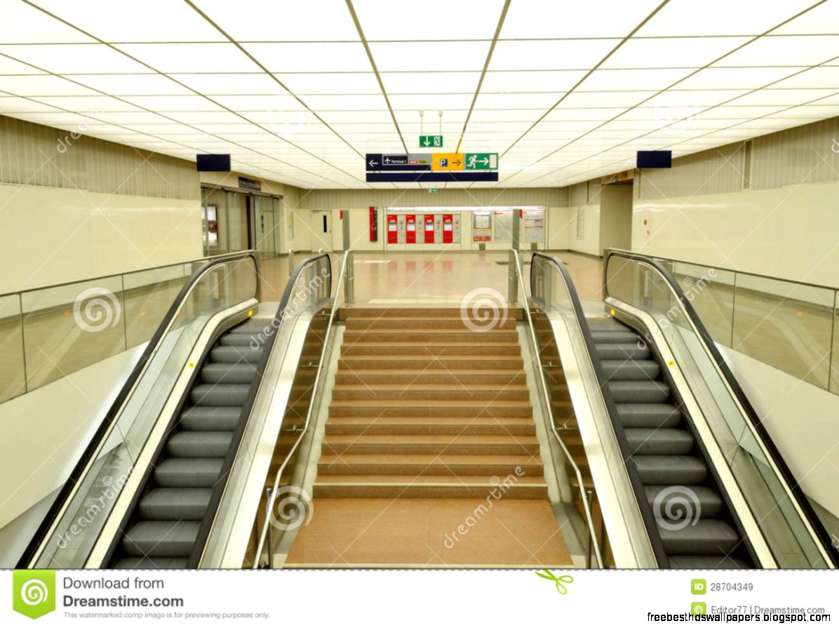 modern train station The escalators with tickets machine in the back modern train station The escalators with tickets machine in the back
