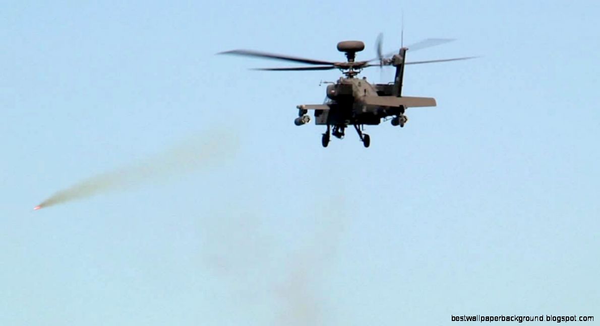 AH 64 Apache Helicopter in Action Rocket Launch Machine Gun AH 64 Apache Helicopter in Action Rocket Launch Machine Gun
