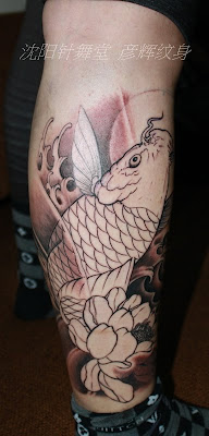 koi fish tattoo on the leg