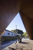 Origami House Design with A-Frame in an Old Village Surrounded by Mountains Origami House Design with A-Frame in an Old Village Surrounded by Mountains
