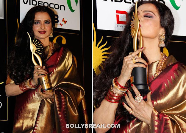 Rekha in a red and gold sari  - (2) -  Vidya Balan and Rekha Kissing T R O P H I E S - iifa 2012