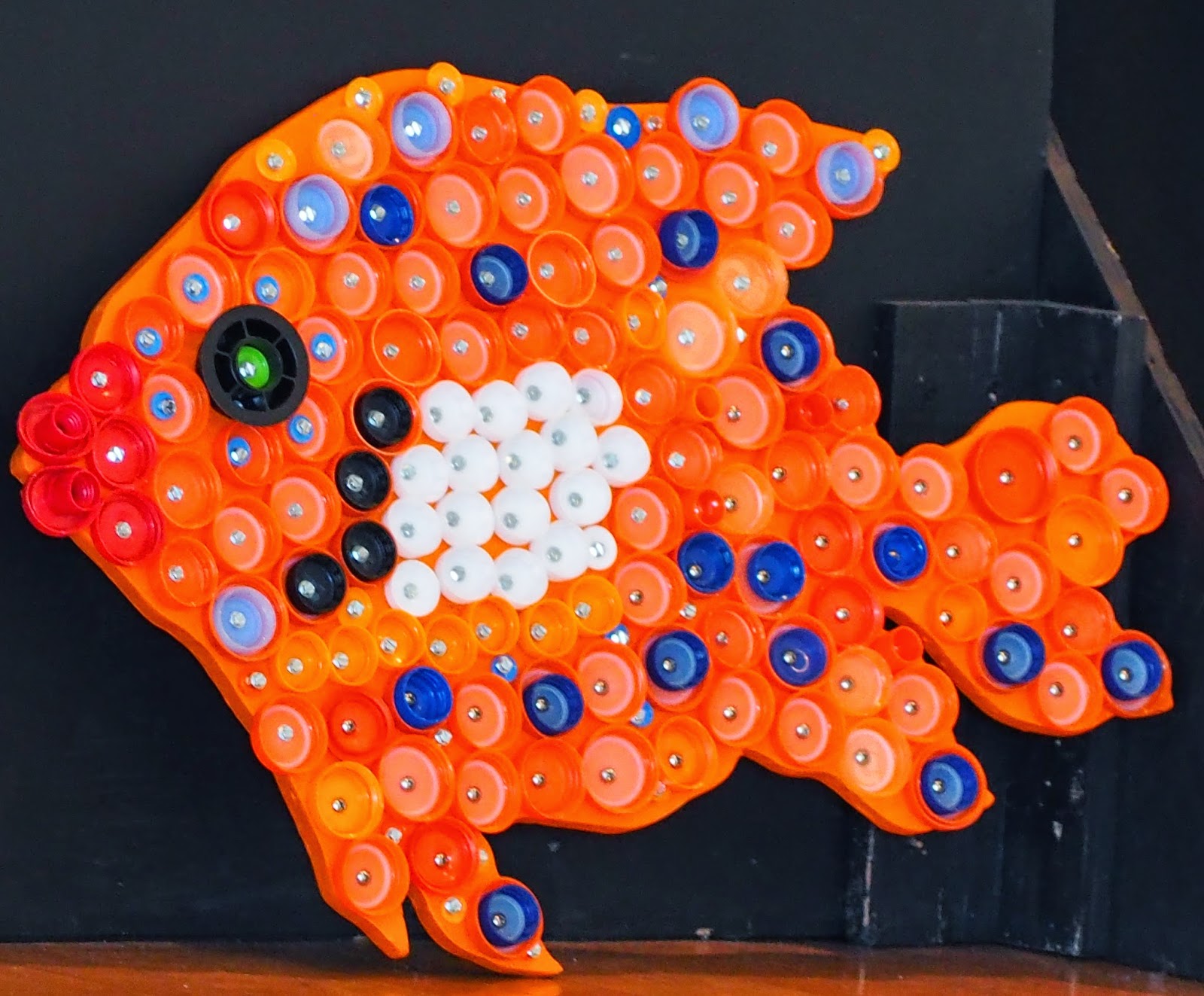 NEPTUNE 911 For Kids Art from Plastic Bottle Caps Collected by Students