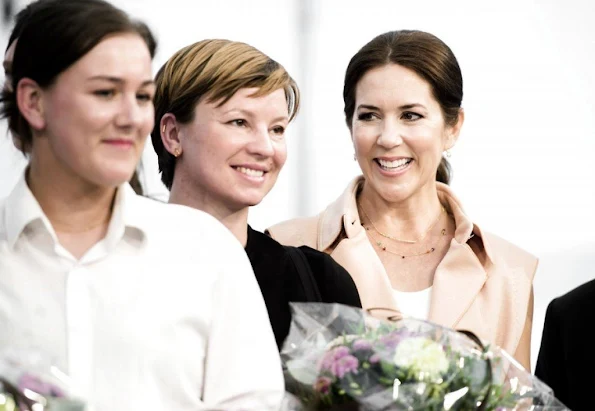 Crown Princess Mary of Denmark visited the collection stand of fashion designing students