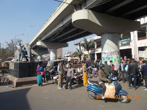 Main market junction in Imphal City at landmark "Shamu Makong" statue. .