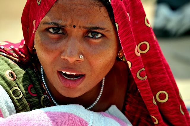 portrait indian tribal woman women girl tarnetar gujarat fair festival colourful face