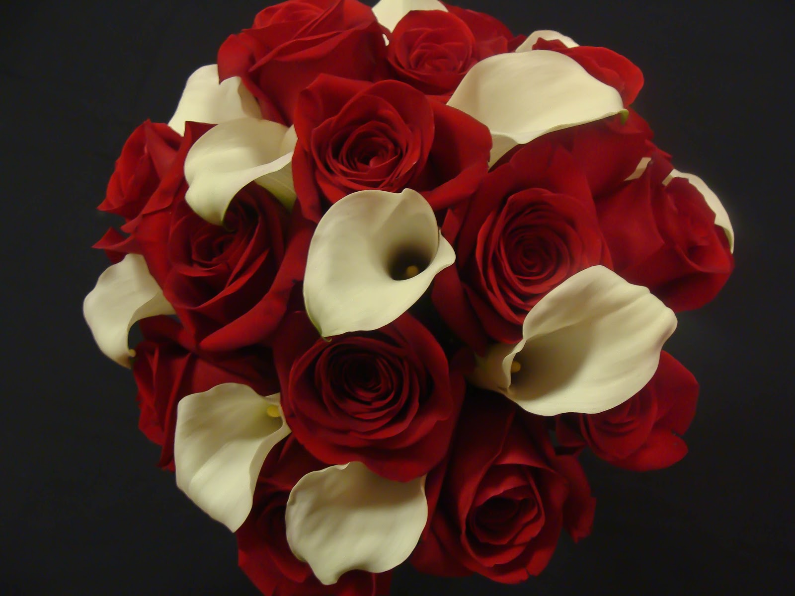 florissimo red roses and white calla lilies