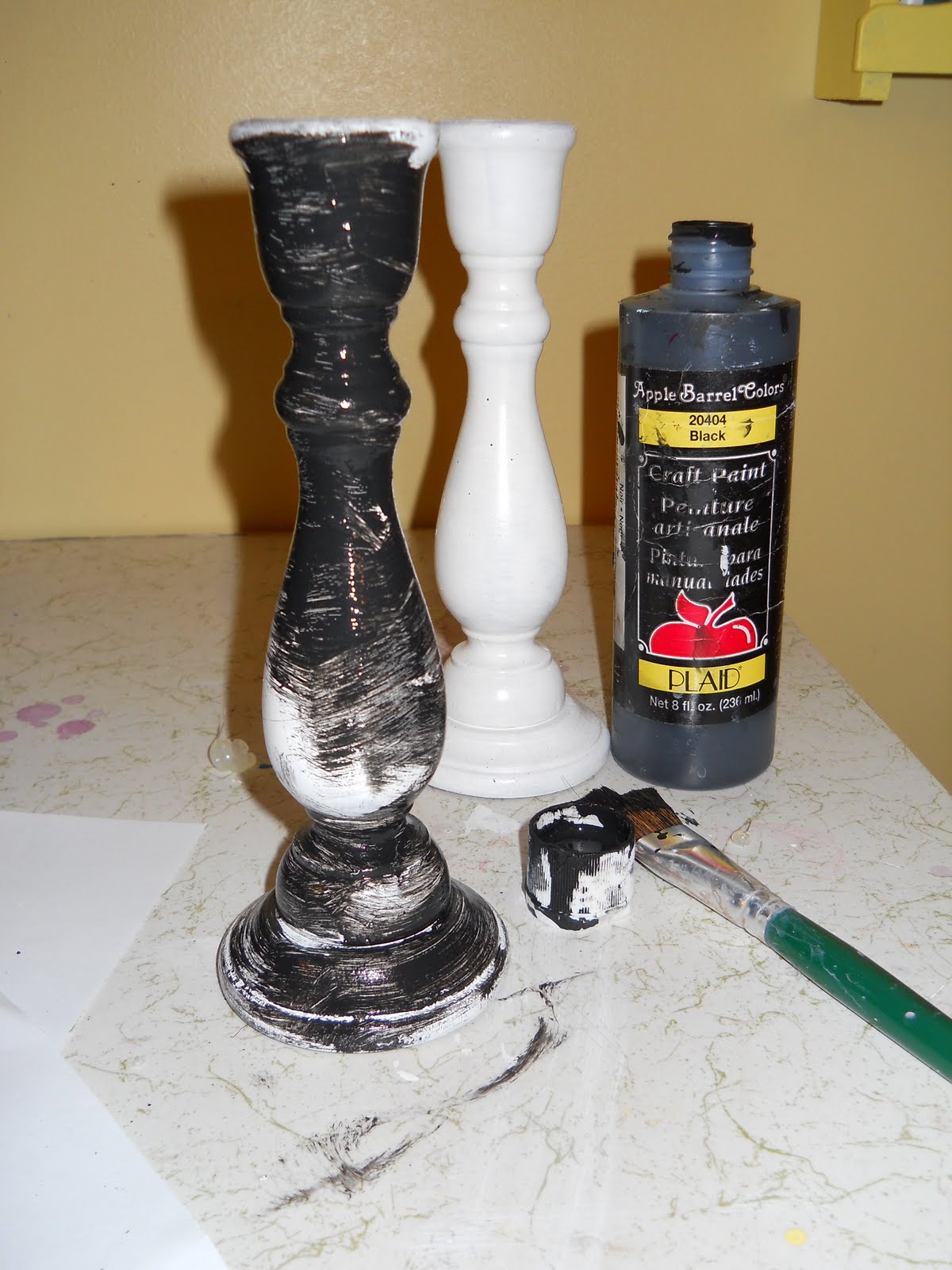 DIY Paint Rub Technique to Distress Candlesticks