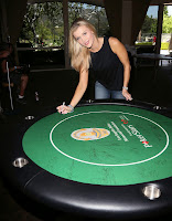 Joanna Krupa sinning a poker table
