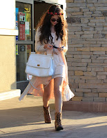 Selena Gomez leggy in a short dress
