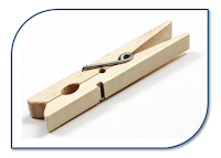 Wooden clothes peg in a customized rectangle with rounded corners.