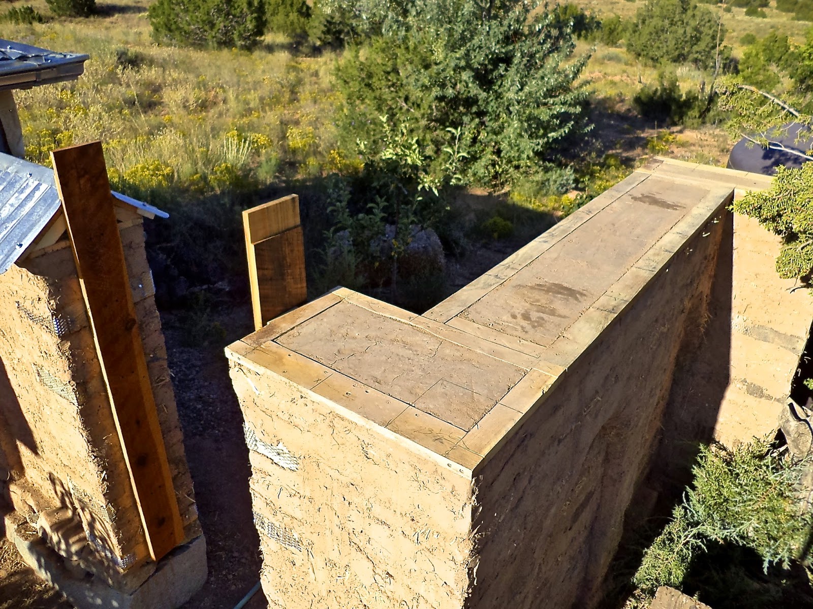 Alt. Build Blog Building An Adobe Wall 4 Putting On The Cap