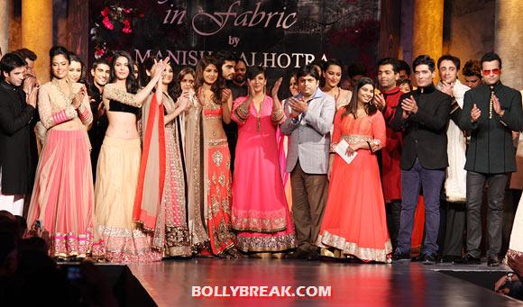 Shabana Azmi (sixth from left, front row) applauds Manish Malhotra (second from right), front row as the celebrities look on - (30) - Priyanka, Dia, Parineeti & other Celebs catwalk for a cause