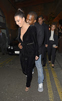 Kim Kardashian gbiting Kim's neck