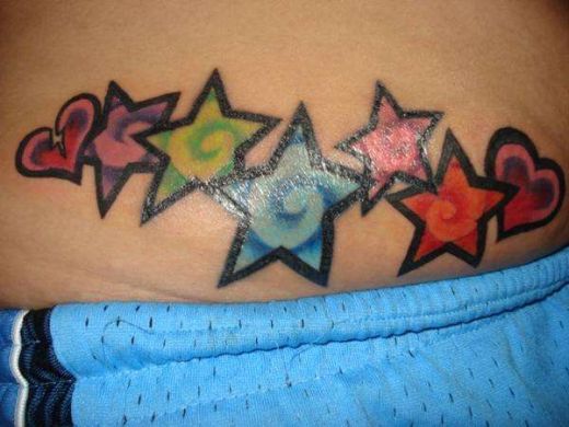 lower back tattoos stars. star tattoo lower back. lower back tattoos stars.