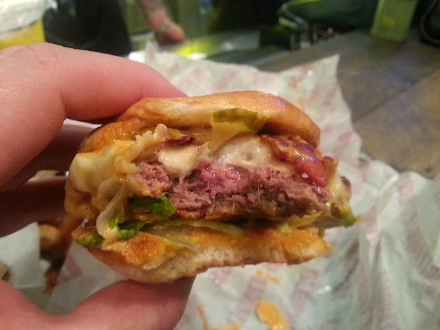 Dirty Burger Flaming Hot burger bite-through