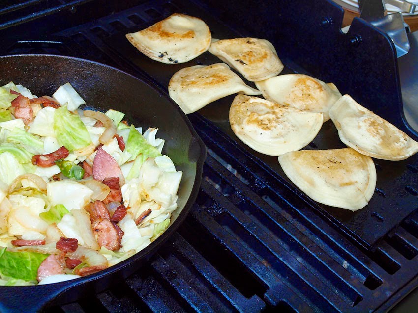 Pellet Smoker Cooking Pork Chops W/ Pierogies, Bacon, Onions and Cabbage