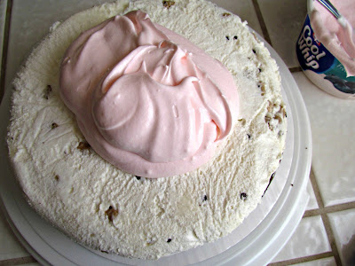 cake with dollup of pink frosting