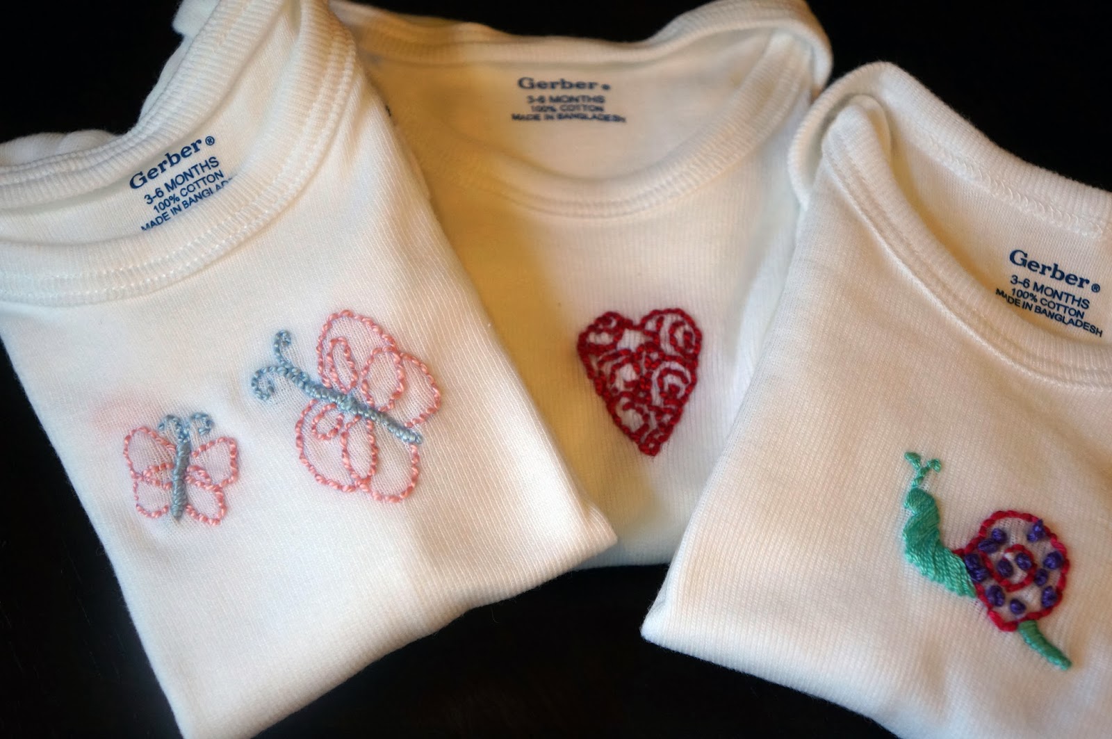 adorned abode archive Hand Embroidered Baby Onesies