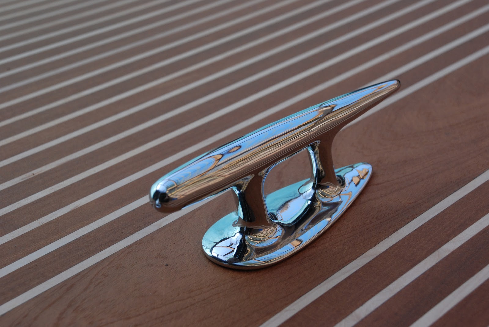 my wooden speed boat build Riva Style Bow light / cleat and bow fairleads