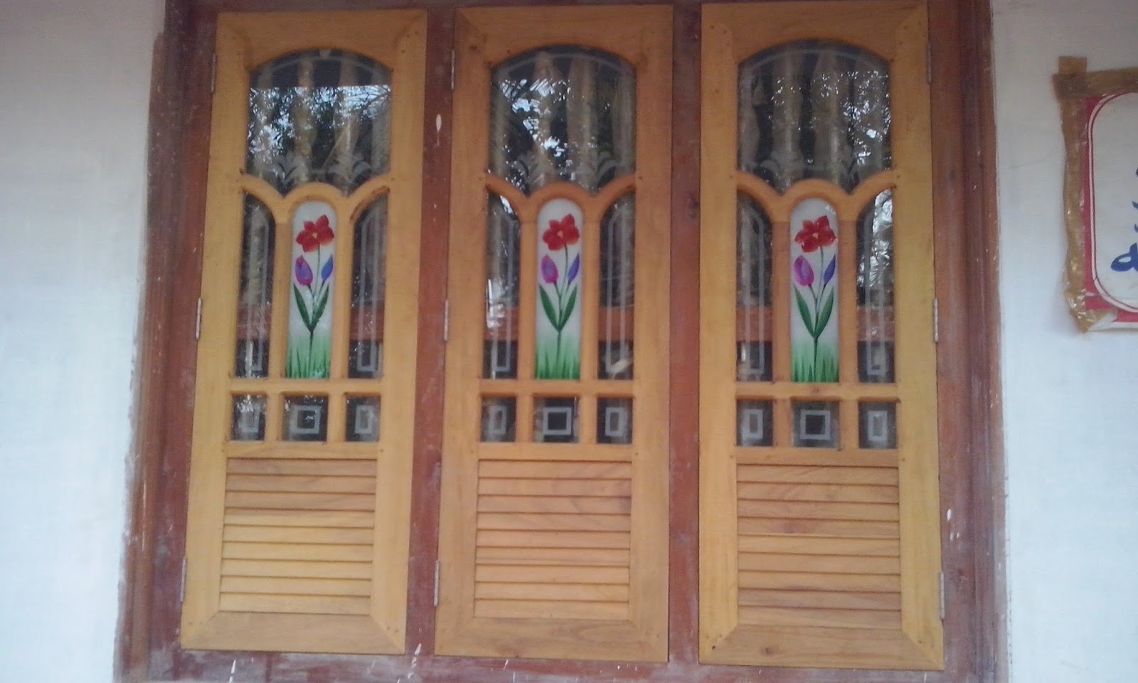 kerala style Carpenter works and designs wooden window designs Main