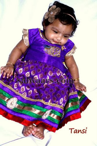 Small Kid in Purple Silk Skirt