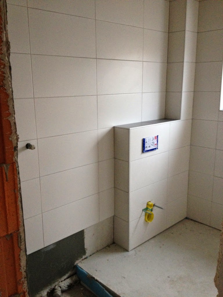 Abenteuer Hausbau Fliesenarbeiten Schleifgiraffe