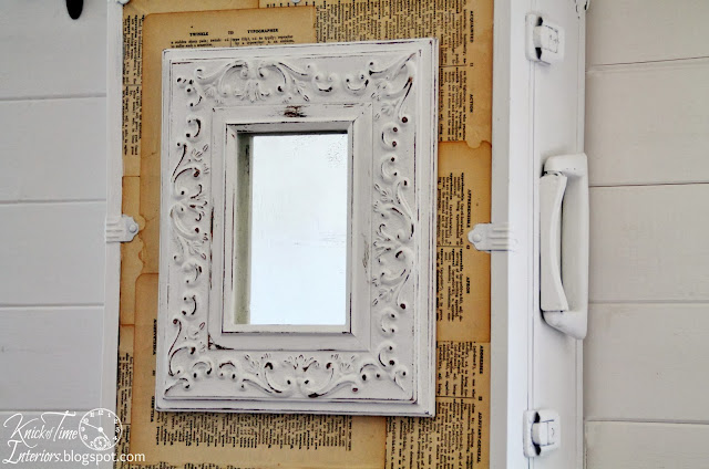 Repurposed Trunk Wall Cabinet by Knick of Time Repurposed Trunk into Wall Cabinet with Dictionary Pages and Framed Mirror by Knick of Time