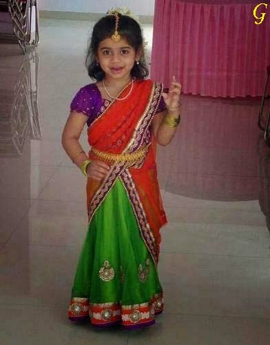 small baby girl in saree