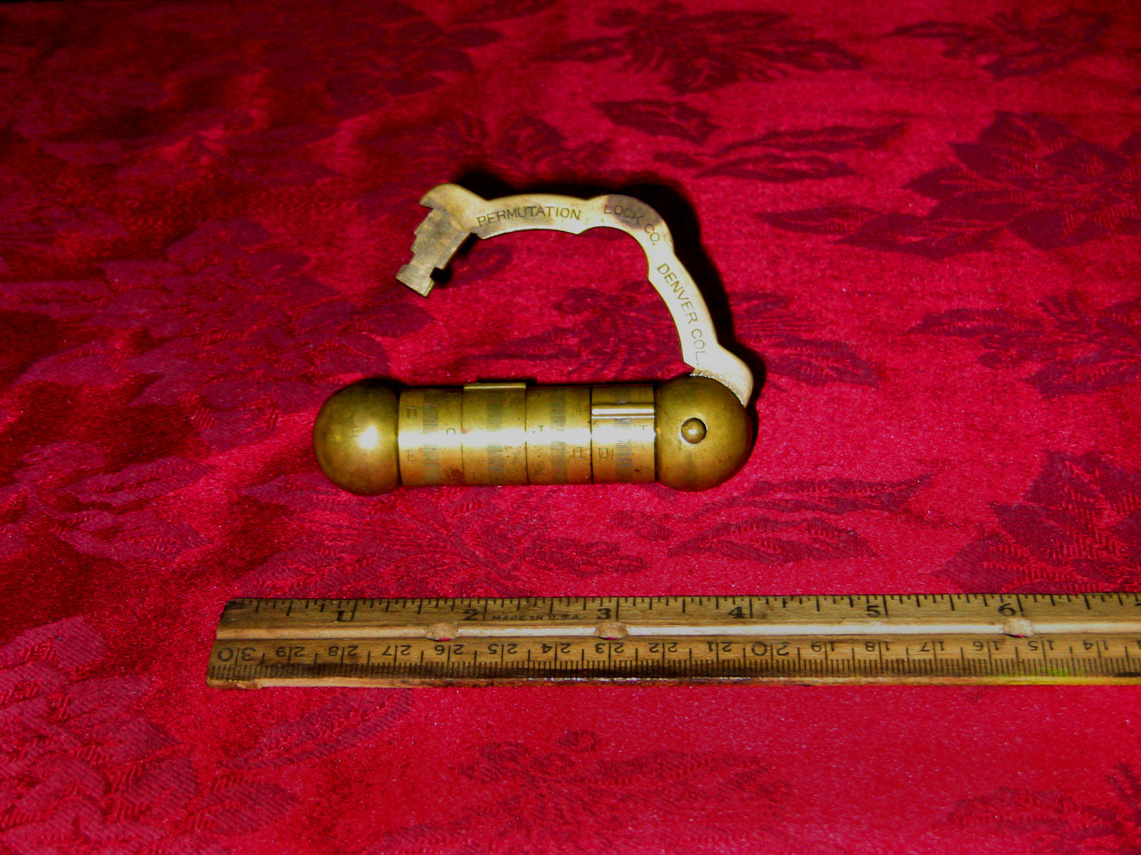 RestraintsBlog PERMUTATION LOCK CO. BRASS 4 WHEELS COMBINATION PADLOCK